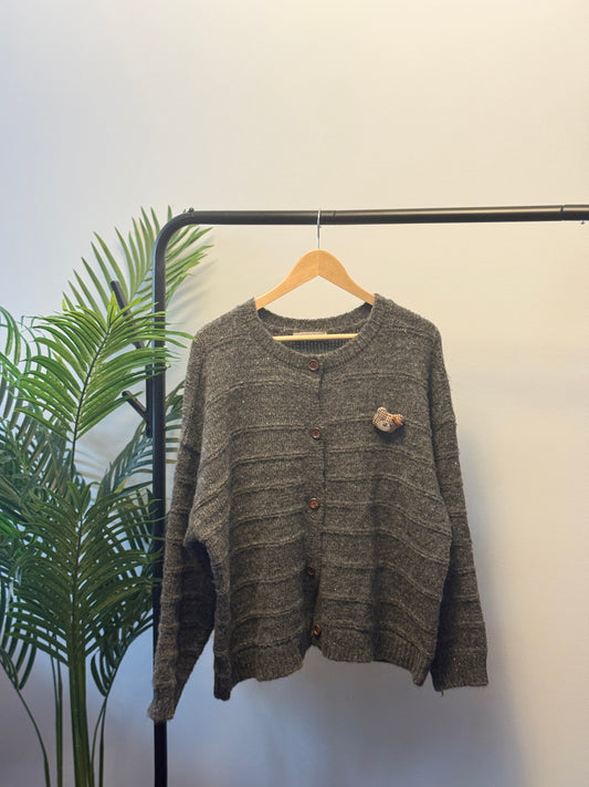 Cardigan with bear pin
