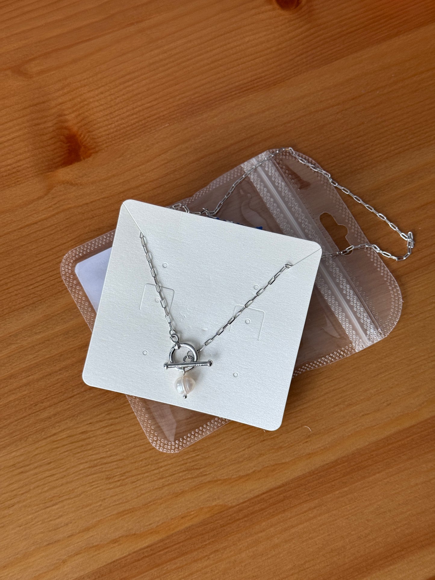 Necklace with faux pearl