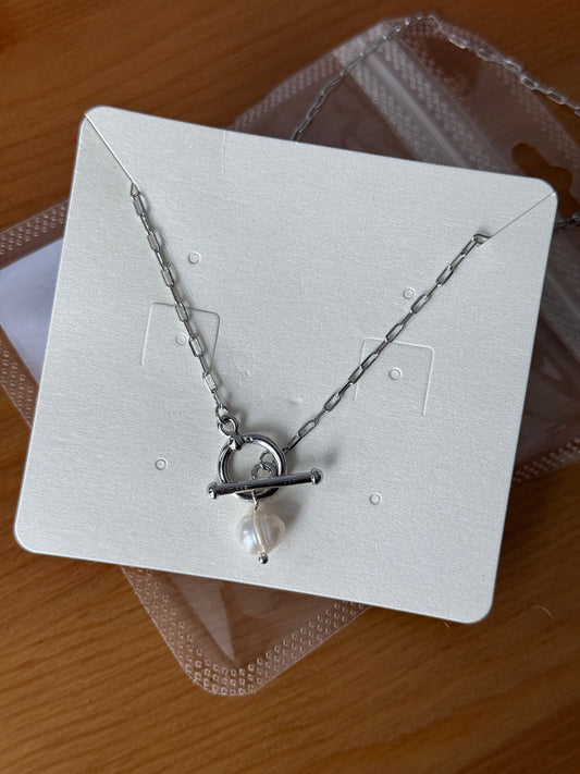 Necklace with faux pearl