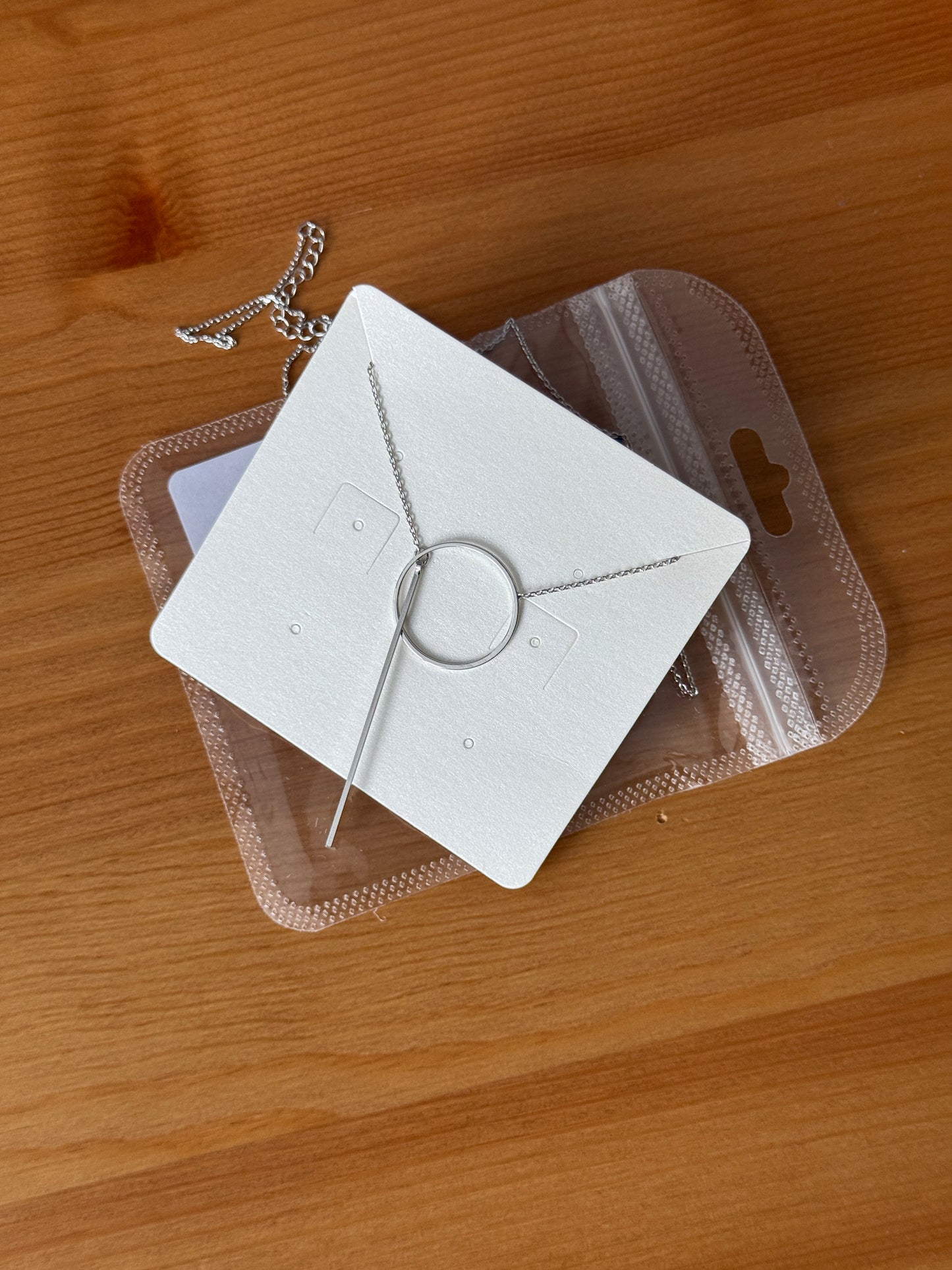 Needle and loop necklace