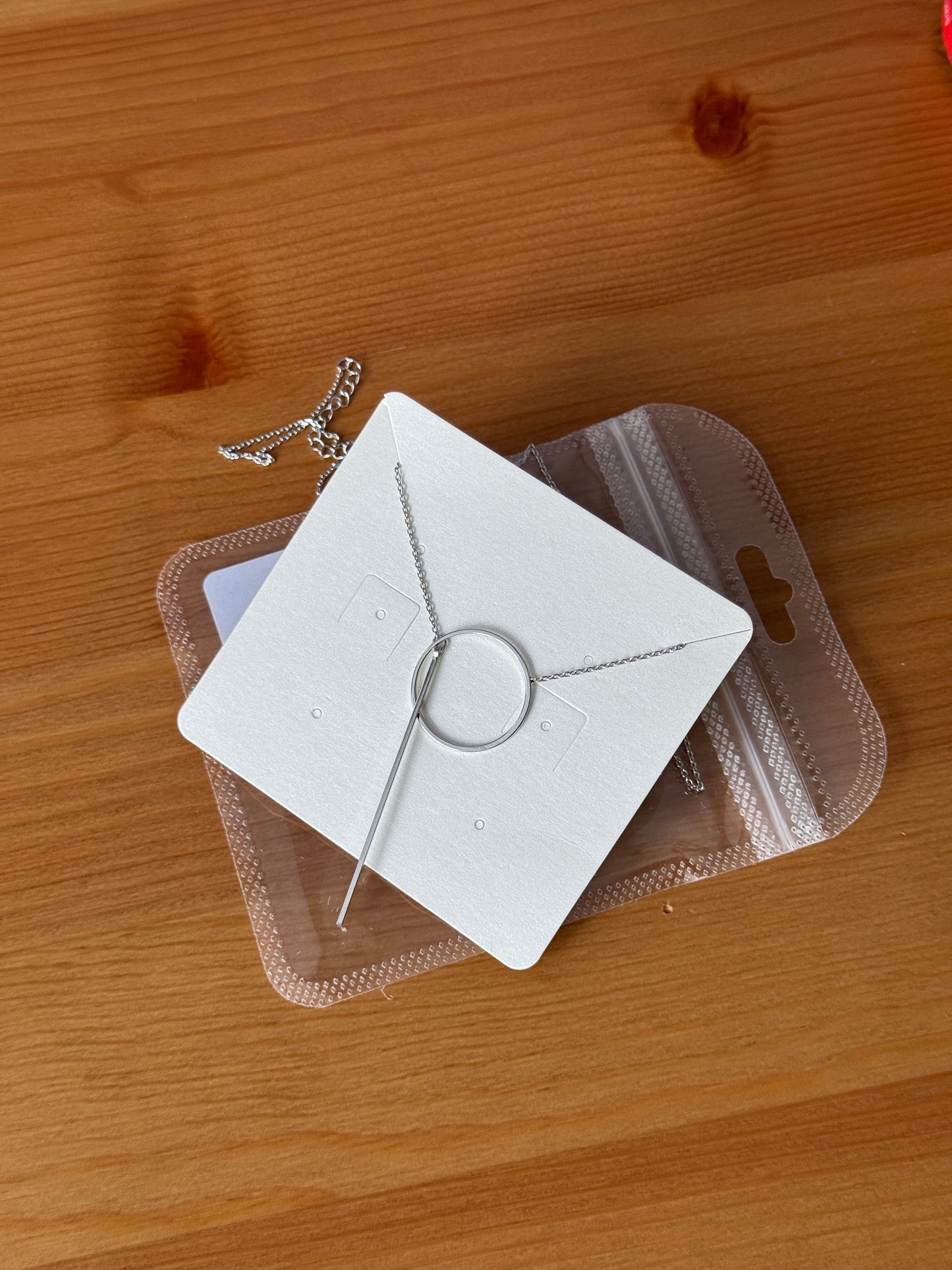 Needle and loop necklace